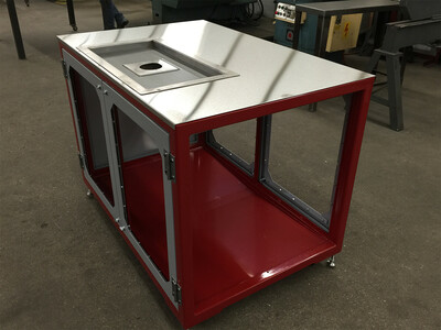 Stand with stainless top. Removable perforated sink.